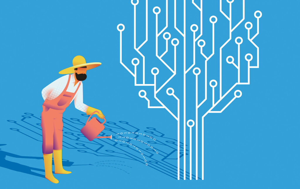 Puutarhuri kastelee puuta.